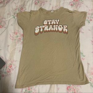 stay strange tee